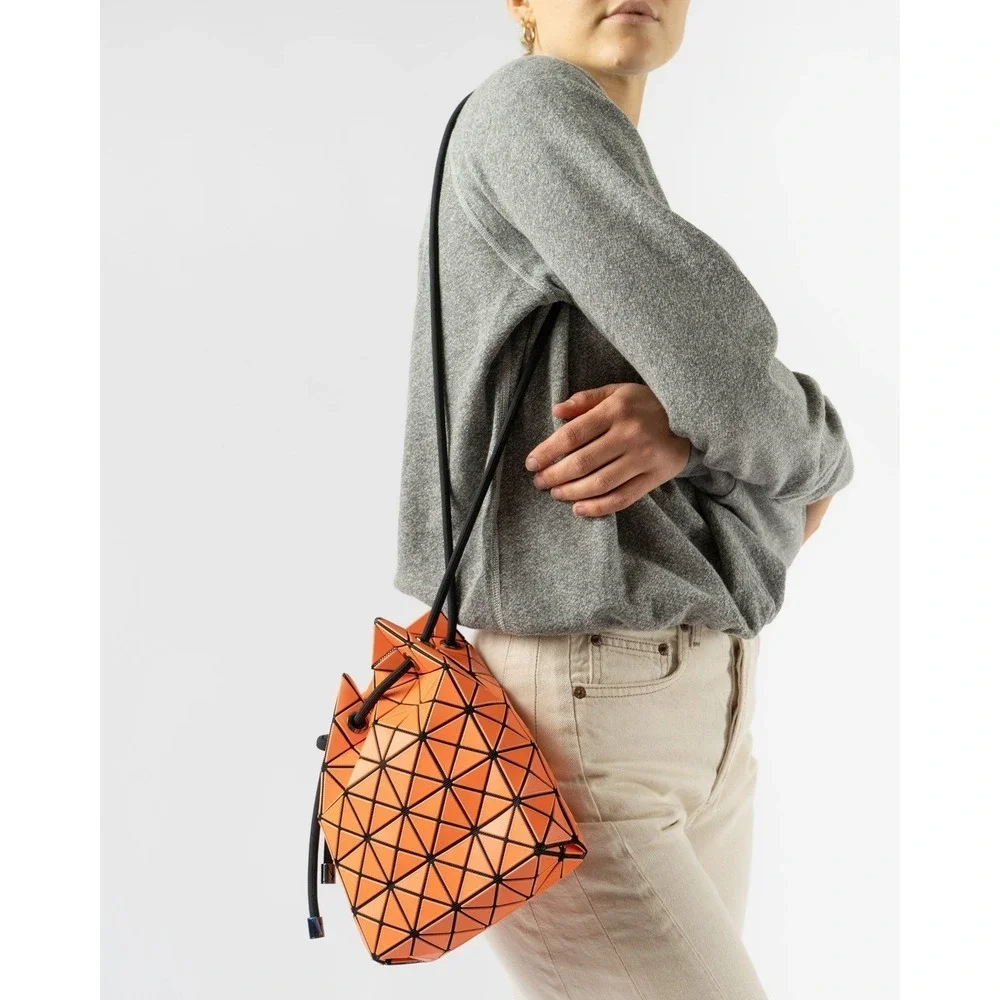 Bao Bao Issey Miyake Wring Matte Orange Bucket Bag, direct from Taipei. Abstract